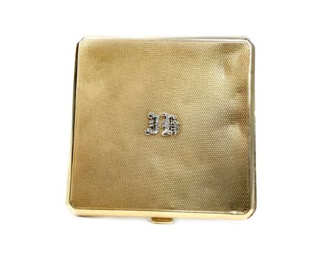 EARLY 20TH CENTURY NINE CARAT GOLD COMPACT, maker Ramsden &amp; Roed, engine turned exterior, the hinged cover initialled 'JH