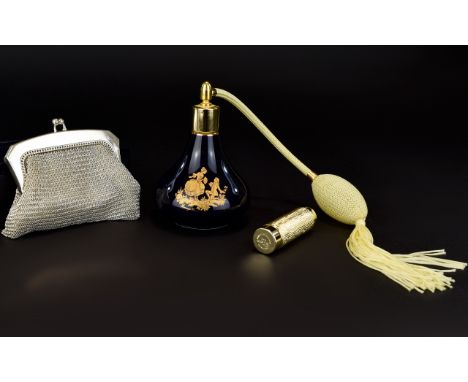A Vintage Limoges Castel Ceramic Perfume Atomiser Along With Handbag Atomiser And Chainmail Purse Midnight blue and gilt frag