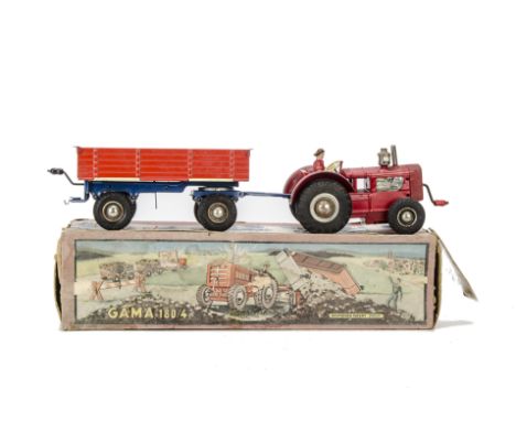 A Gama 180/4 Tractor & Tipping Trailer Set, tinplate clockwork tractor with driver, large rubber wheels with domed hubs, in o
