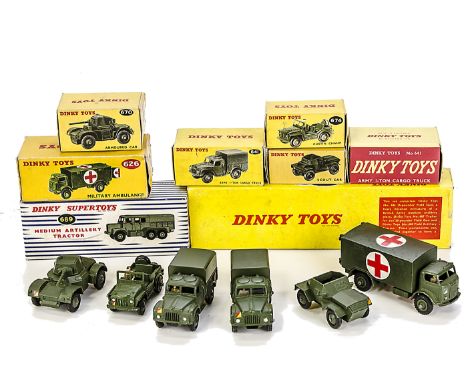 Boxed Military Dinky Toys, 641 Cargo Truck (2), one with glass, 673 Scout Car, 670 Armoured Car, 674 Austin Champ, 626 Milita