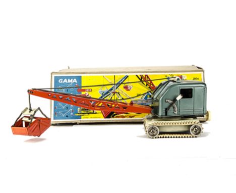 A large scale Gama 2808 clockwork Tinplate Crane with Shovel, in red blue and cream with rubber tracks, in original box, E, b