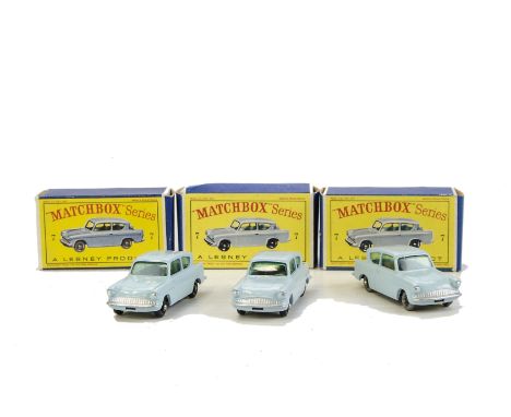 Matchbox 1-75 Series No.7b Ford Anglia, three examples, all light blue body, first and second with BPW, third with SPW, in or