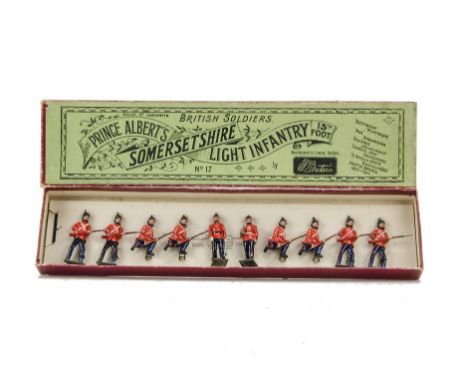 Britains set 17 Somerset Light Infantry, still strung in battle honours box, 1930 version, VG in G box
buglers helmet spike m