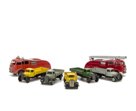 Dinky Toys Commercials, 25e Tipping Wagon, four examples, first and second, grey body, type 4, grey ridged hubs, third yellow