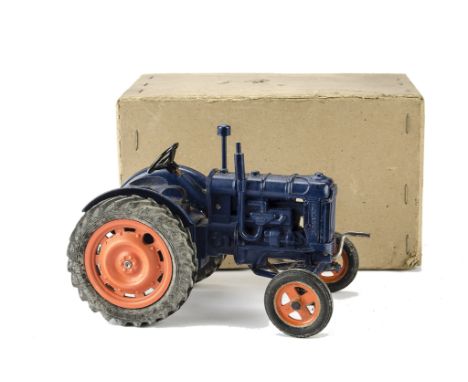 A Chad Valley Fordson Major clockwork Tractor, in blue, in original box with inspection slip, VG-E, box G, hole to lid
clockw