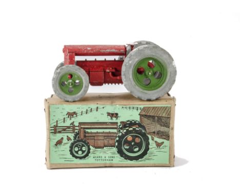 A rare Mears and Sons Tottenham Tractor, in red with green hubs, in original box, VG, some whiting to steering wheel and pain