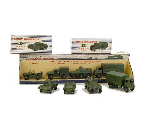 A Dinky Toys 699 Military Vehicles Gift Set, comprising Austin Champ, Cargo Truck, Personnel Carrier and 3-Ton Army Wagon, 65