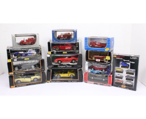 Diecast: A collection of assorted boxed diecast scale models to include: Maisto, Onyx, ERTL, Solido and others. General condi