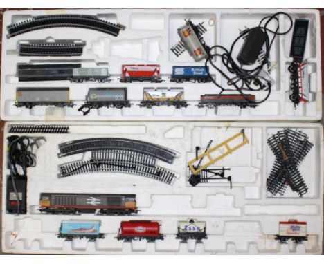 Model Railway: A boxed part-complete Hornby Railways Midnight Freight Train Set, together with a part-complete Hornby Railway