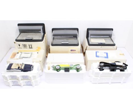 Franklin Mint: A collection of three boxed Franklin Mint diecast model vehicles, all complete with boxed display cases, to co