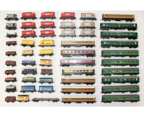 Model Railway: A collection of fifty unboxed OO Gauge model railway coaches and rolling stock to include Hornby, Triang and L