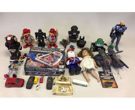 VARIOUS TOYS/ROBOTS. A quantity of dolls, cars and robot toys to include a boxed 'Space Fantasy' electronic pinball game.