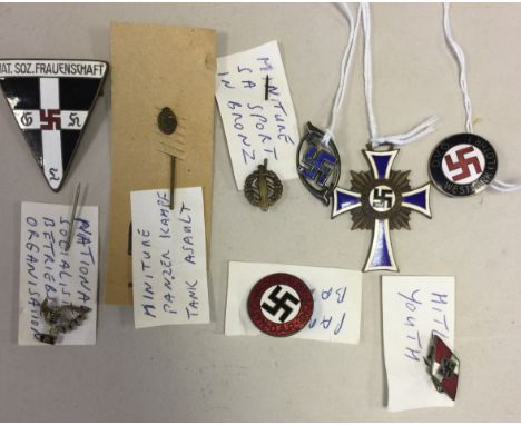 THIRD REICH ENAMEL PIN BADGES. Eight assorted badges including Hitler Youth, Panzer Tank Assault, NSBO and others