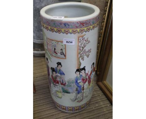 A DECORATIVELY PAINTED ORIENTAL CERAMIC CYLINDRICAL STICK STAND 