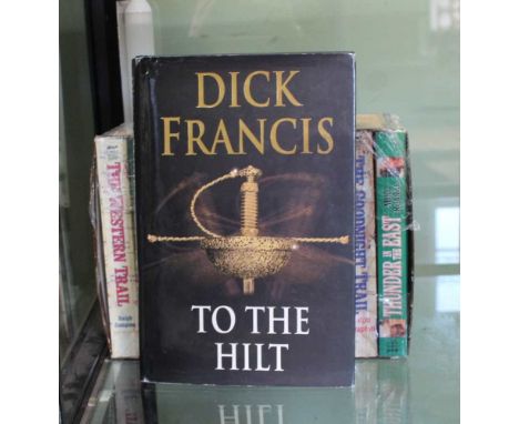 A DICK FRANCIS FIRST EDITION TITLED 'TO THE HILT', together with a boxed collection of paperback cowboy novels 