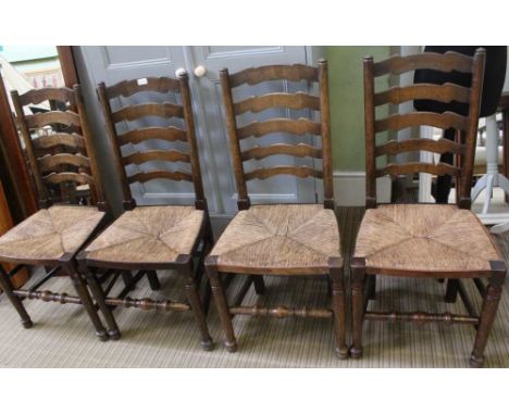 FOUR REPRODUCTION LADDER BACKED CHAIRS with rush seats 
