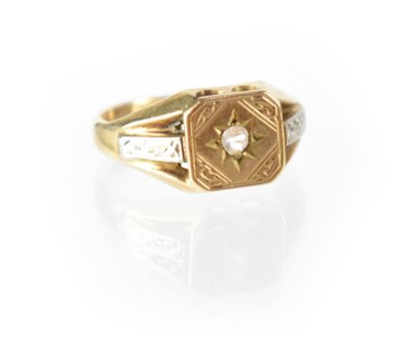 A gentlemen's 9ct yellow gold signet ring with central white stone in star setting, size R, approx 4.2g.