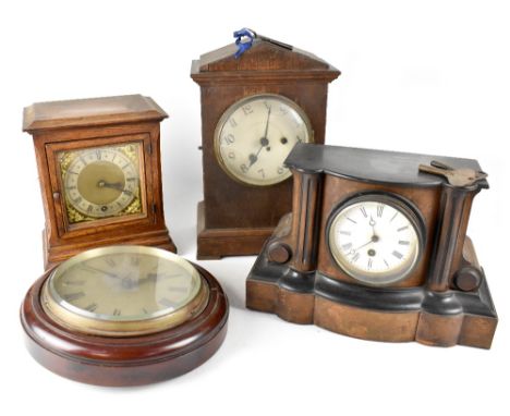 A mahogany-cased wall clock by Synchronome Electric of London, the dial set with Roman numerals and three mantel clocks for r