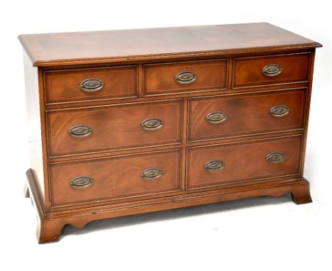 A Georgian-style mahogany cross-banded chest of seven drawers, on bracket feet, 75 x 119.5 x 48.5cm. CONDITION REPORT Light s