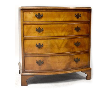 A Georgian-style walnut bow-fronted chest of four drawers, on bracket feet, 83 x 78 x 53cm, and a reproduction walnut occasio