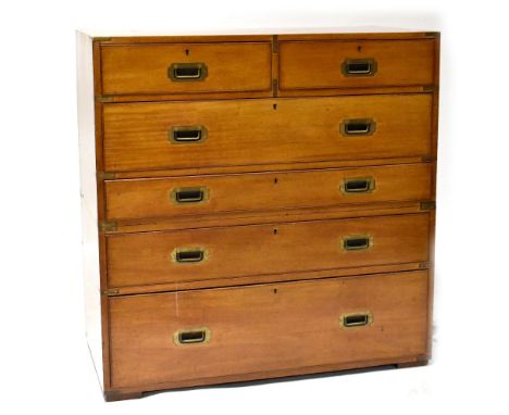 A 19th century brass bound mahogany campaign chest in two parts, the top comprising two short and one long drawer, the base w