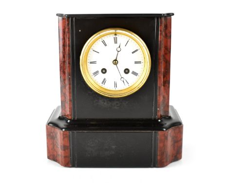 A Victorian black slate and rouge marble eight-day mantel clock with French movement, the white enamelled dial set with Roman