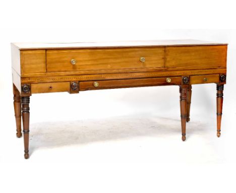 A Georgian inlaid mahogany sideboard converted from a square piano with rectangular top and base of four drawers, on round ri