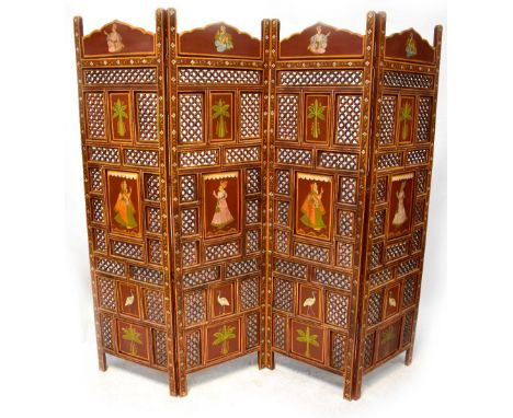 An Indian three-fold four-panel pierced and painted screen decorated with portraits of figures, birds and banana leaves, heig