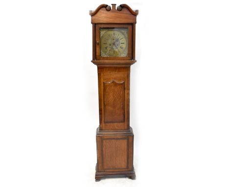 Ratcliff, Wrexham; an oak and mahogany cased eight-day longcase clock, the brass dial set with painted Roman and Arabic numer