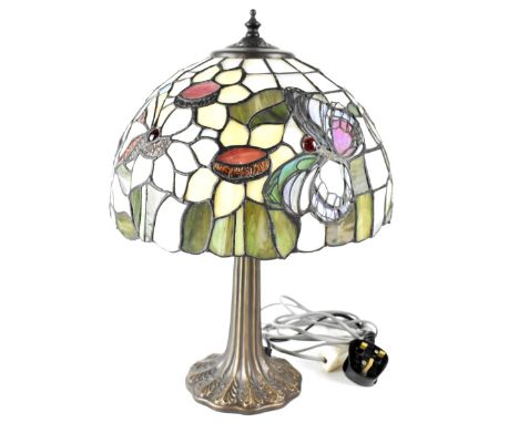 A Tiffany-style table lamp with floral and butterfly decoration to the shade, height 44cm. CONDITION REPORT Not tested