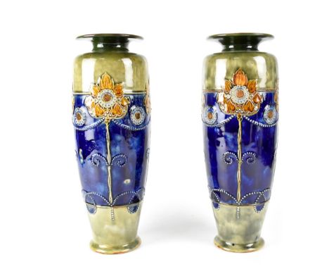 A pair of Royal Doulton Secessionist tall cylindrical sunflower vases, monogrammed to base MB, no.6621, 635, 694 and 5621, he