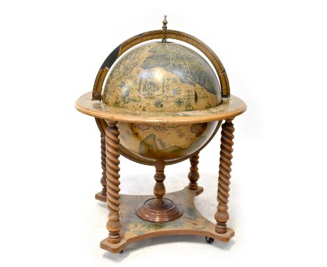 A reproduction globe drinks cabinet with fitted interior, on wrythen turned columns and undertier, height 94cm CONDITION REPO