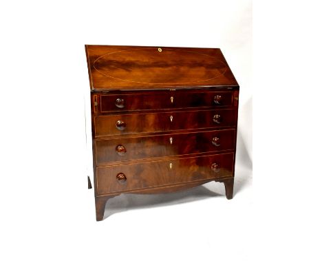 A 19th century mahogany bureau with inlaid fall front above four graduated drawers, on outswept bracket feet, 111 x 54 x 101c