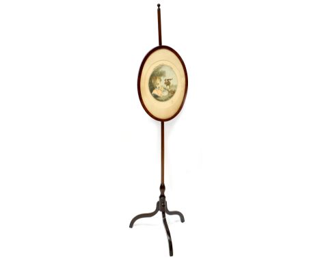 A 19th century mahogany adjustable pole screen with oval panel enclosing a hand coloured print, raised on three outswept legs