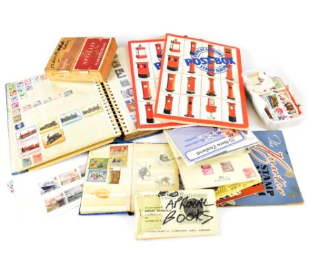 A folder and Stanley Gibbons Postbox stamp albums containing a quantity of stamps to include British, European and world stam