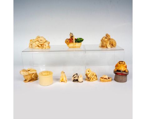 A set of 10 bunny-themed beige-colored items which includes 6 intricately designed treasure boxes, perfect for storing cheris
