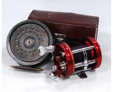 Vintage 3½in trout reel with rim tension screw, the brass foot stamped '3'; also a leather cased Abu Ambassadeur reel, no. 60