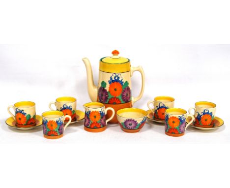 Clarice Cliff thirteen-piece Gayday Bizarre coffee set comprising a coffee pot, 18.5cm high, cream jug, 6.5cm high, sugar bow