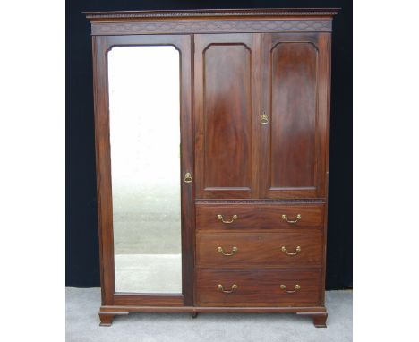 Victorian Heal & Son of London mahogany mirrored wardrobe with base drawers, on bracket feet, 207cm high and 157cm wide.   Co
