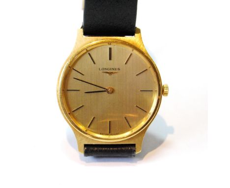 Gent's Longines 18ct gold watch, manual, brushed gilt dial, on strap, Import Marks 1977, cased.