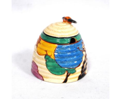Clarice Cliff Fantasque Autumn pattern honey jar in the form of a skep, 9cm high.   Condition Report  No cracks, chips or res