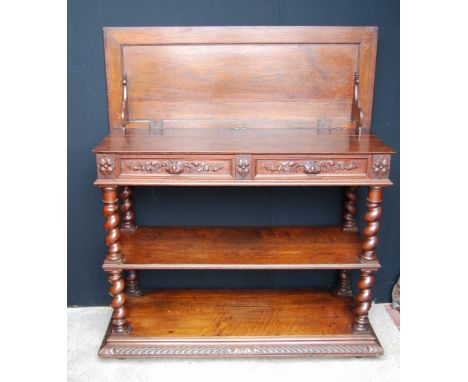 Victorian oak buffet with hinged top above two drawers, on barley twist supports, 141cm high and 117cm wide.