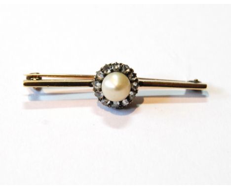 Victorian gold pin with pearl and diamond cluster.
