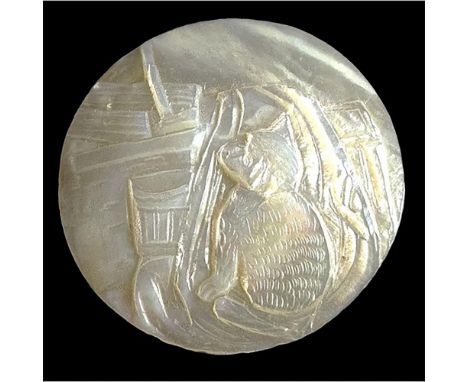 1 Large 20th century pearl button of a dog. This adorable dog is carved in low relief on a 1930's pearl made in Bethlehem Jer