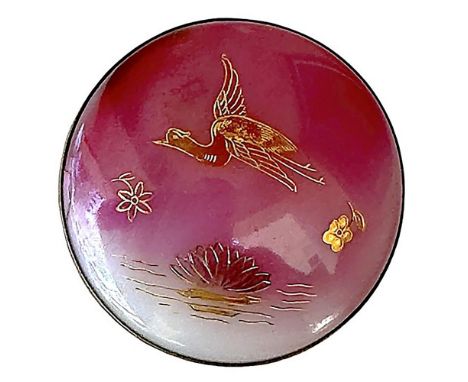 1 Large 19th century pink glass with a bird on it. This exquisite button shows an engraved and gilded bird flying over water.