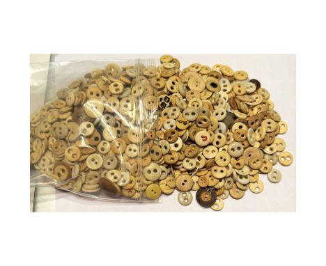 A bag full of bone underwear buttons from the 18th &amp; 19th C. These little underwear buttons are quite earthy and have alw