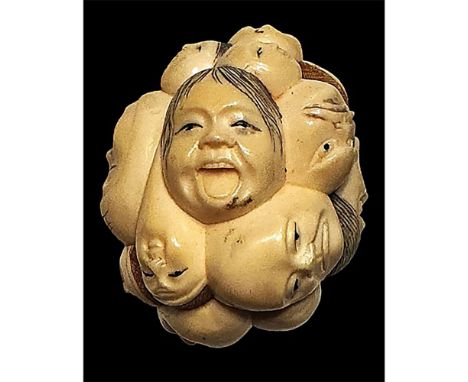 1 Large hand carved and engraved multi face example. Here is a very finely detailed natural material carving from Japan known