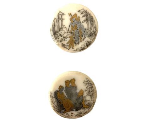2 Large early 20th C. figural cream colored porcelain buttons. These two wonderful large porcelain buttons have silver and go