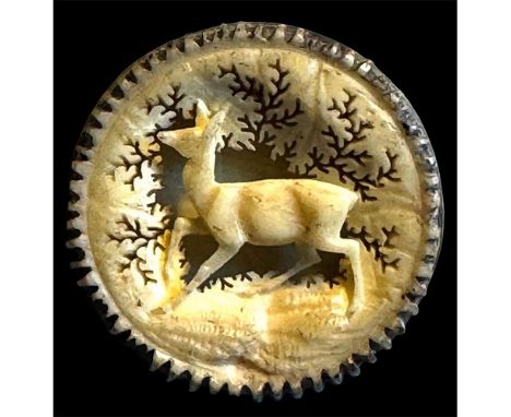 1 Medium 19th C. example of a deer mounted in a fine setting. This button is exquisitely hand carved and pierced from natural
