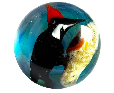 1 Medium size 20th century Will Stokes paperweight button. This colorful button depicts a bird on sa branch and was hand made